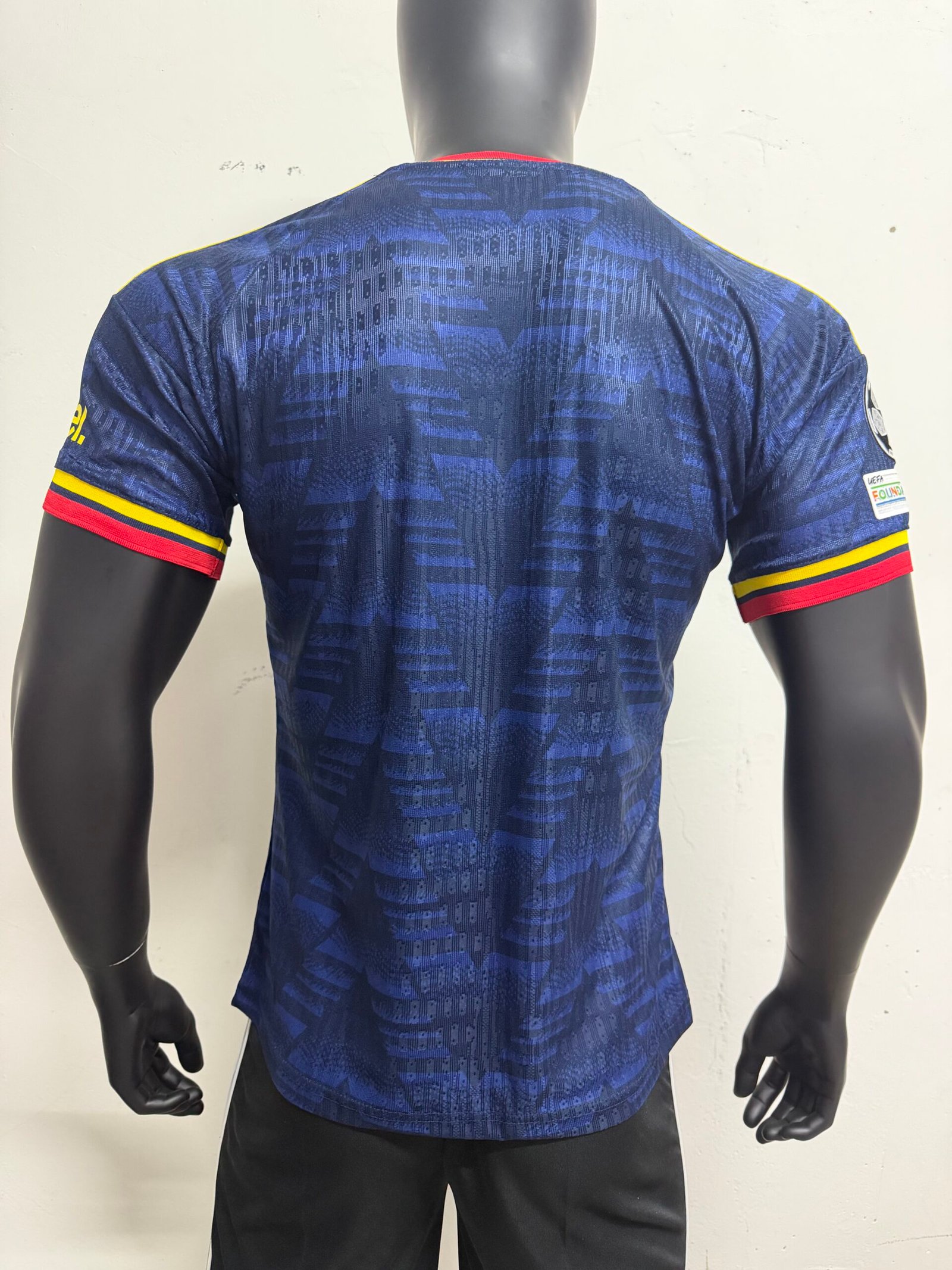 Alternative view of Player 26-27 Arsenal away wearing Champions League armband