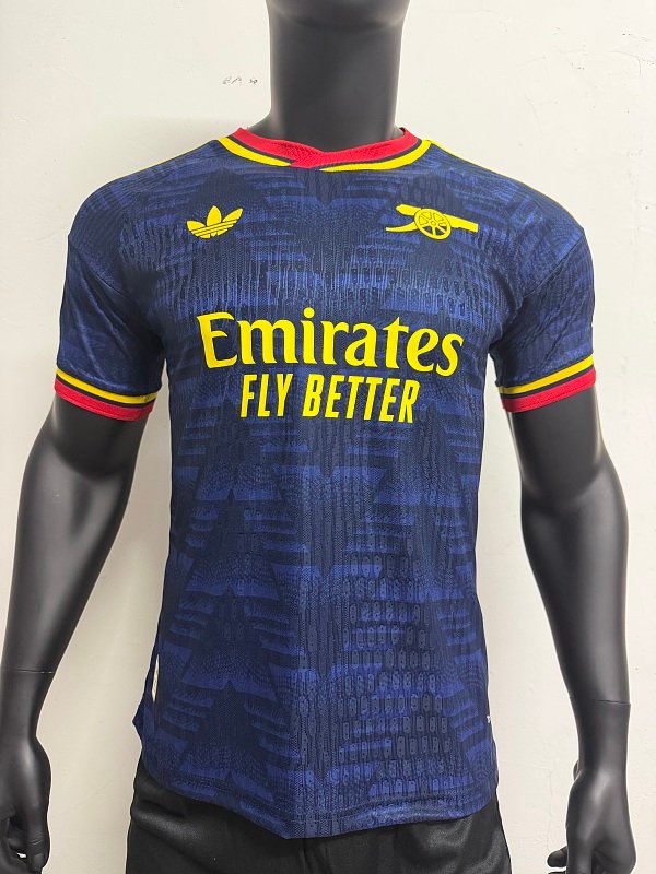 Player 26-27 Arsenal away wearing Champions League armband